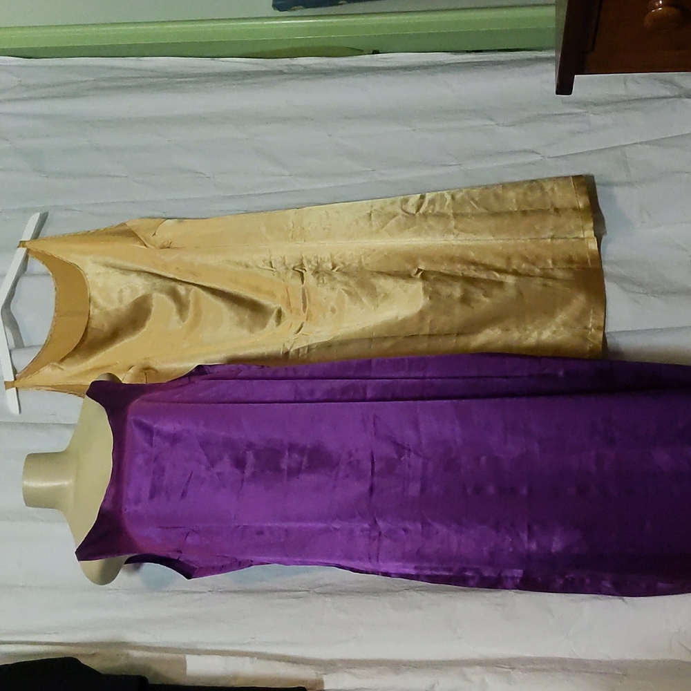 Bundle of two Long slip dresses in soft satiny fabric one purple, one gold.